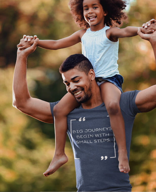 A man carrying his child on his shoulders advocating mental health for parents in West Bloomfield, Michigan