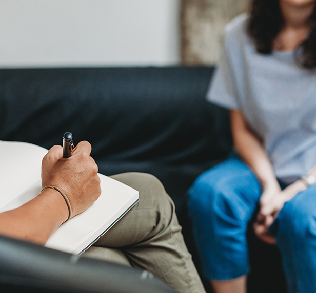 A therapist takes notes about generalized anxiety disorder (GAD)