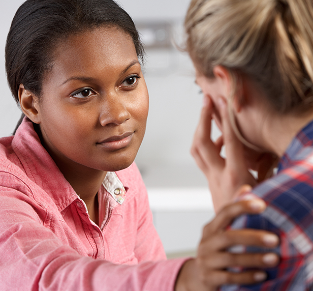 a woman tells her friend about her experiences with bipolar disorder.