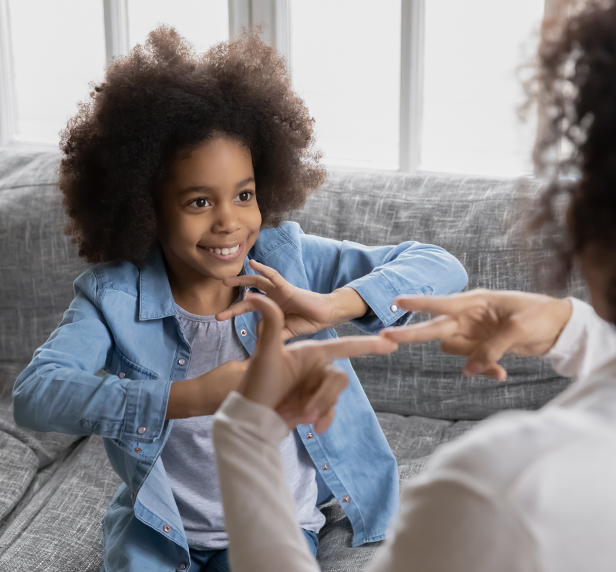 A child doing attention deficit hyperactivity disorder (ADHD) games with her therapist.