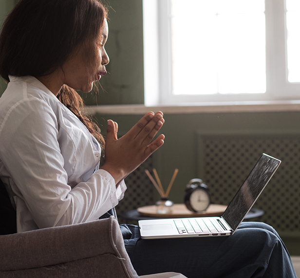 A therapist performs a teletherapy session.