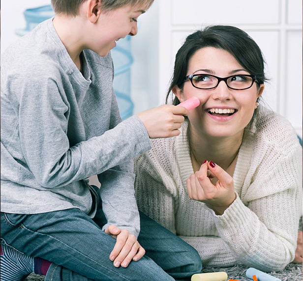 A child and their mom in therapy. A 'Person-Centered' approach to treatment is often utilized by therapists when there is a need for the client to have an opportunity to develop a sense of self.
