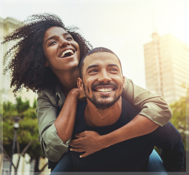 A couple happy that their insurance covers mental health services.